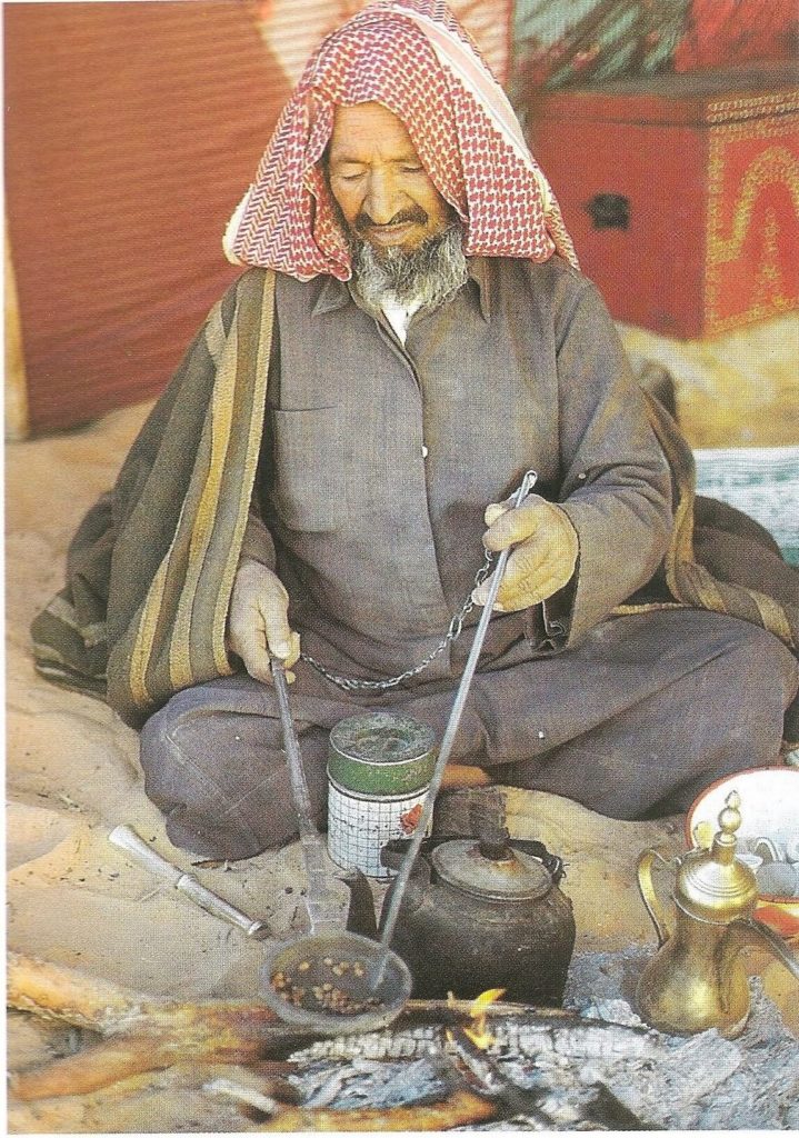 saudi arabesque - bedouin making arabic coffee