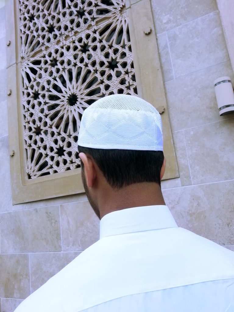 saudi arabesque - man wearing skullcap