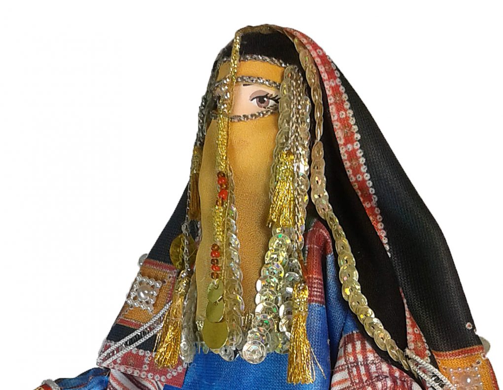 Porcelain Souvenir Doll in Traditional Women’s Dress of the Harb Tribe front side crop