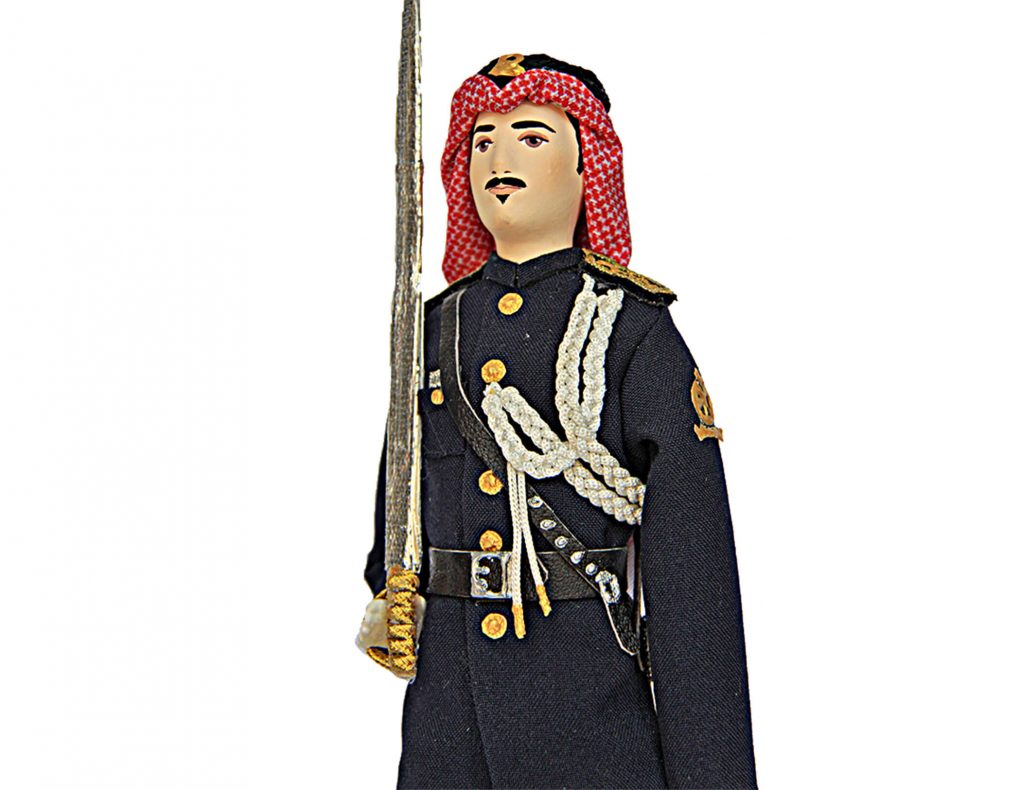 Porcelain Souvenir Doll in the Uniform of the National Guard of the Kingdom of Saudi Arabia front crop